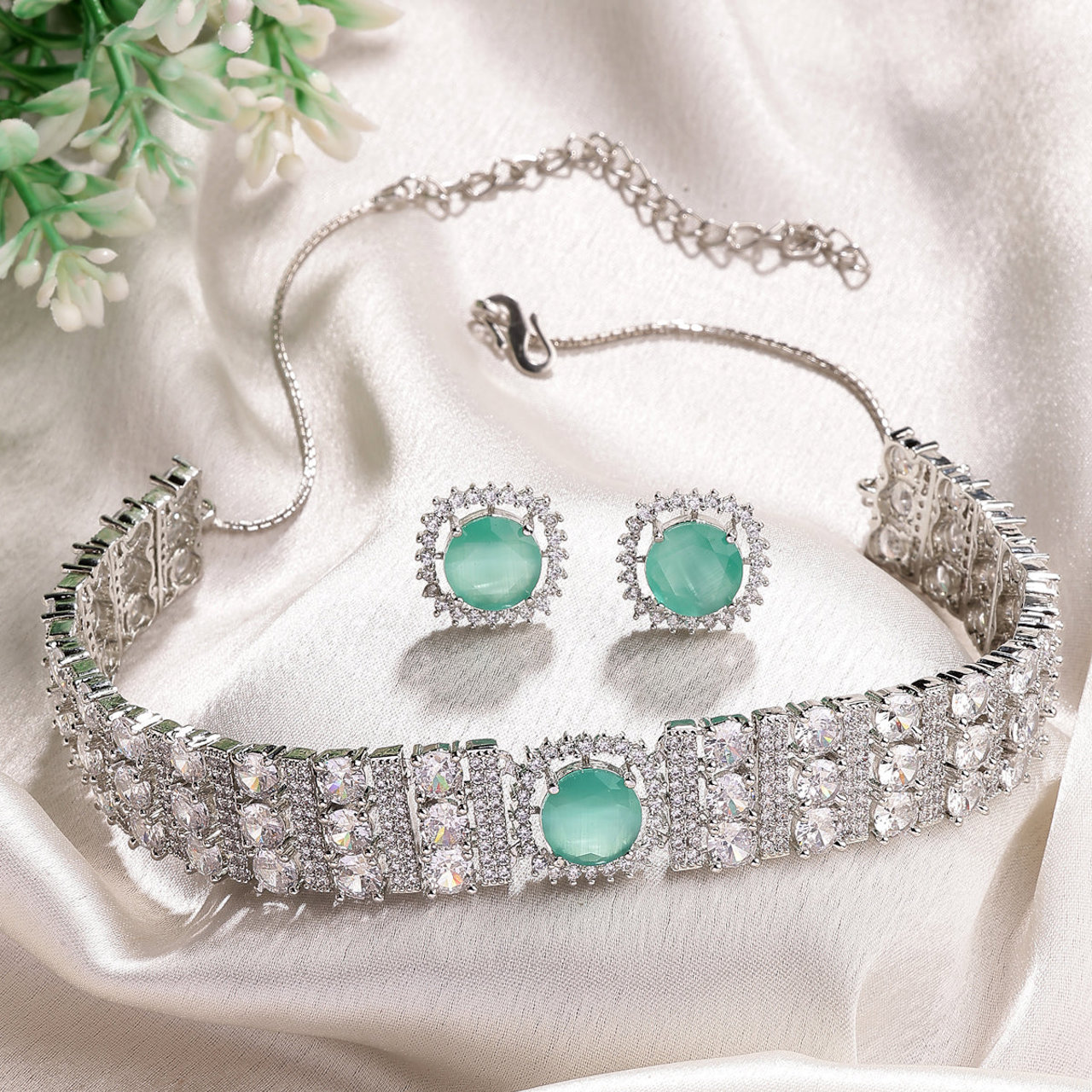 Sukkhi Glamorous Fashionable Design Rhodium Plated Cubic Zirconia Studded Mint Green Brass Choker Necklace with Studs Earrings Jewellery Set for Women
