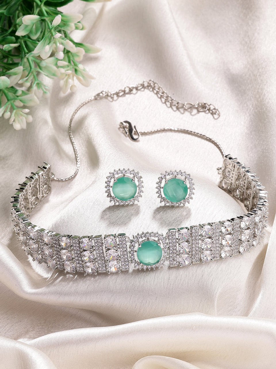 Sukkhi Glamorous Fashionable Design Rhodium Plated Cubic Zirconia Studded Mint Green Brass Choker Necklace with Studs Earrings Jewellery Set for Women