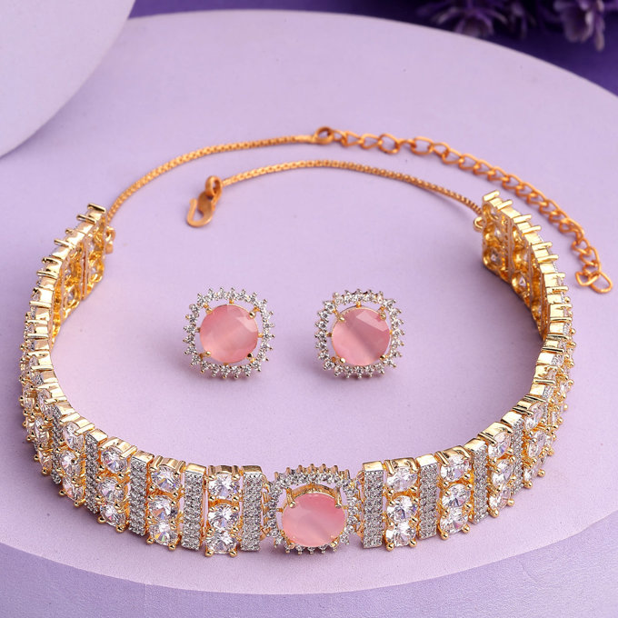 Sukkhi Attractive Pink Gold Plated Cubic Zirconia Studded Brass Choker Necklace with Studs Earrings Jewellery Set for Women