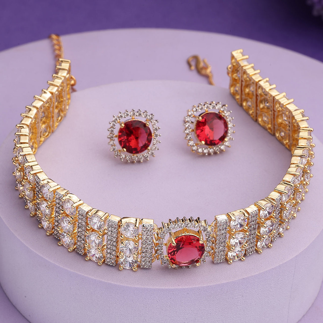Sukkhi Radiant Red Gold Plated Cubic Zirconia Studded Brass Choker Necklace with Studs Earrings Jewellery Set for Women