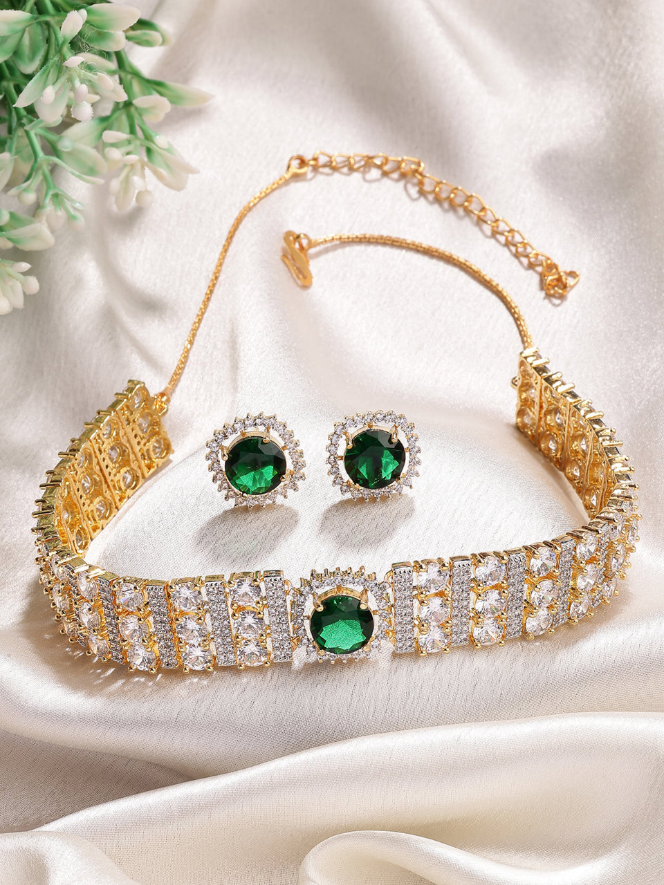 Sukkhi Eye Catchy Gold Plated Cubic Zirconia Studded Emerald Green Brass Choker Necklace with Studs Earrings Jewellery Set for Women