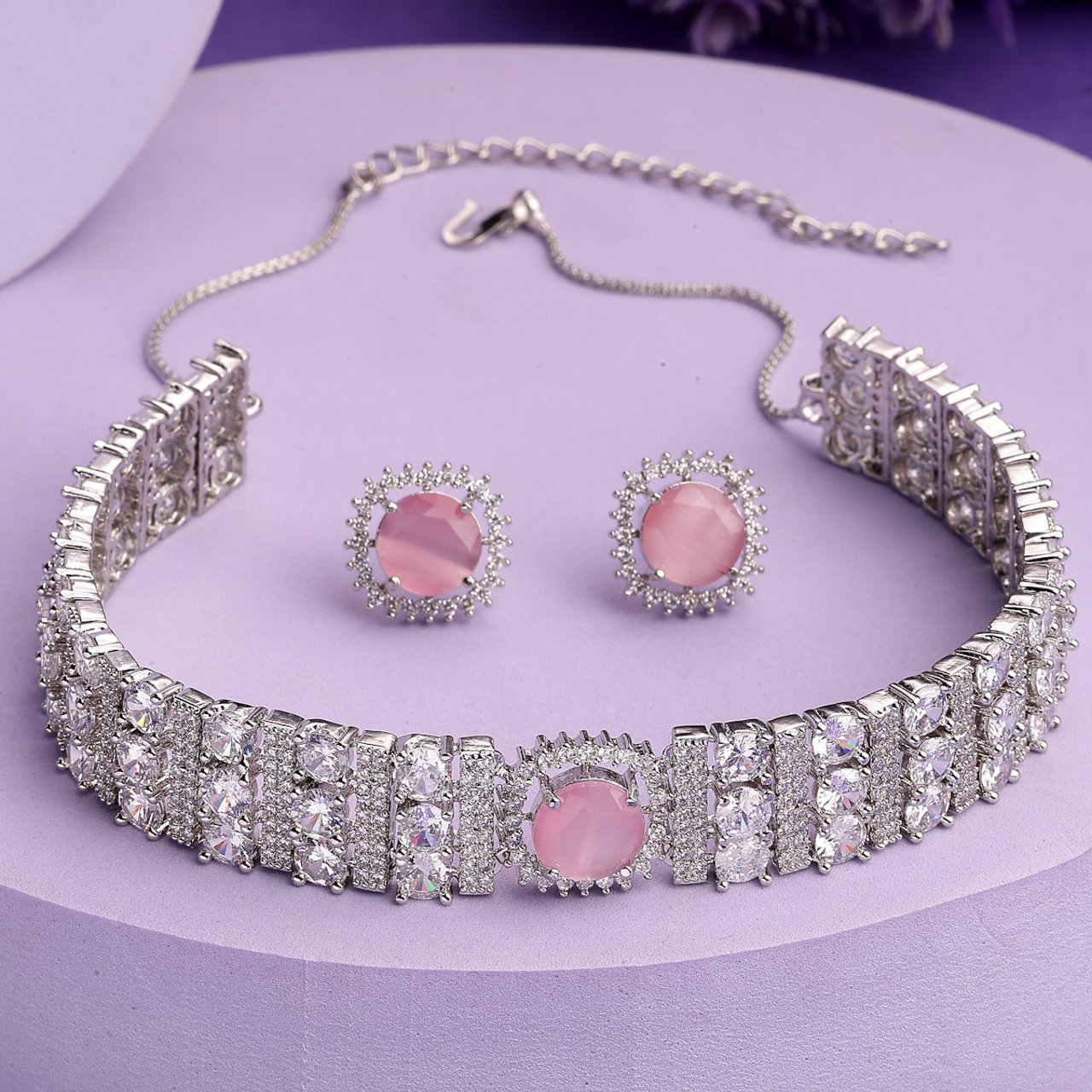 Sukkhi Elegant Stylish Rhodium Plated Cubic Zirconia Studded Brass Pink Choker Necklace with Studs Earrings Jewellery Set for Women