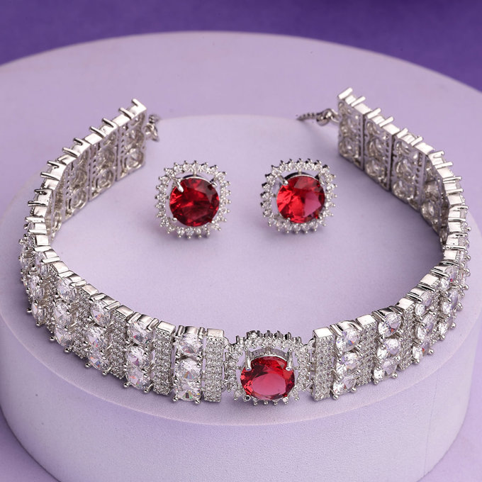 Sukkhi Red Cherry Stylish Rhodium Plated Cubic Zirconia Studded Brass Choker Necklace with Studs Earrings Jewellery Set for Women
