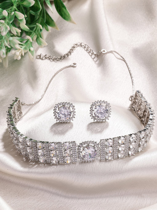 Sukkhi Decent Stylish Design Rhodium Plated Cubic Zirconia Studded White Brass Choker Necklace with Studs Earrings Jewellery Set for Women