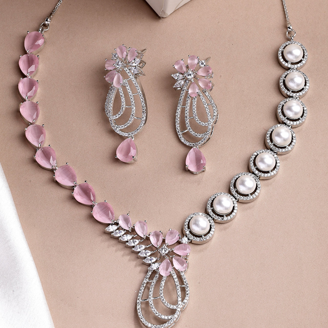 Sukkhi Pretty Pink Tear Drop Round Design Rhodium Plated Cubic Zirconia & Pearl Studded Brass Collar Necklace & Drop Earrings Jewellery Set for Women
