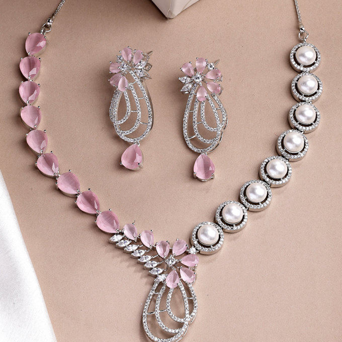 Sukkhi Pretty Pink Tear Drop Round Design Rhodium Plated Cubic Zirconia & Pearl Studded Brass Collar Necklace & Drop Earrings Jewellery Set for Women