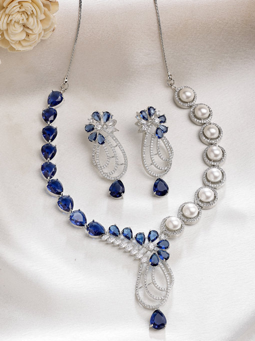Sukkhi Classic Tear Drop Round Design Rhodium Plated Cubic Zirconia & Pearl Studded Blue Brass Collar Necklace & Drop Earrings Jewellery Set for Women