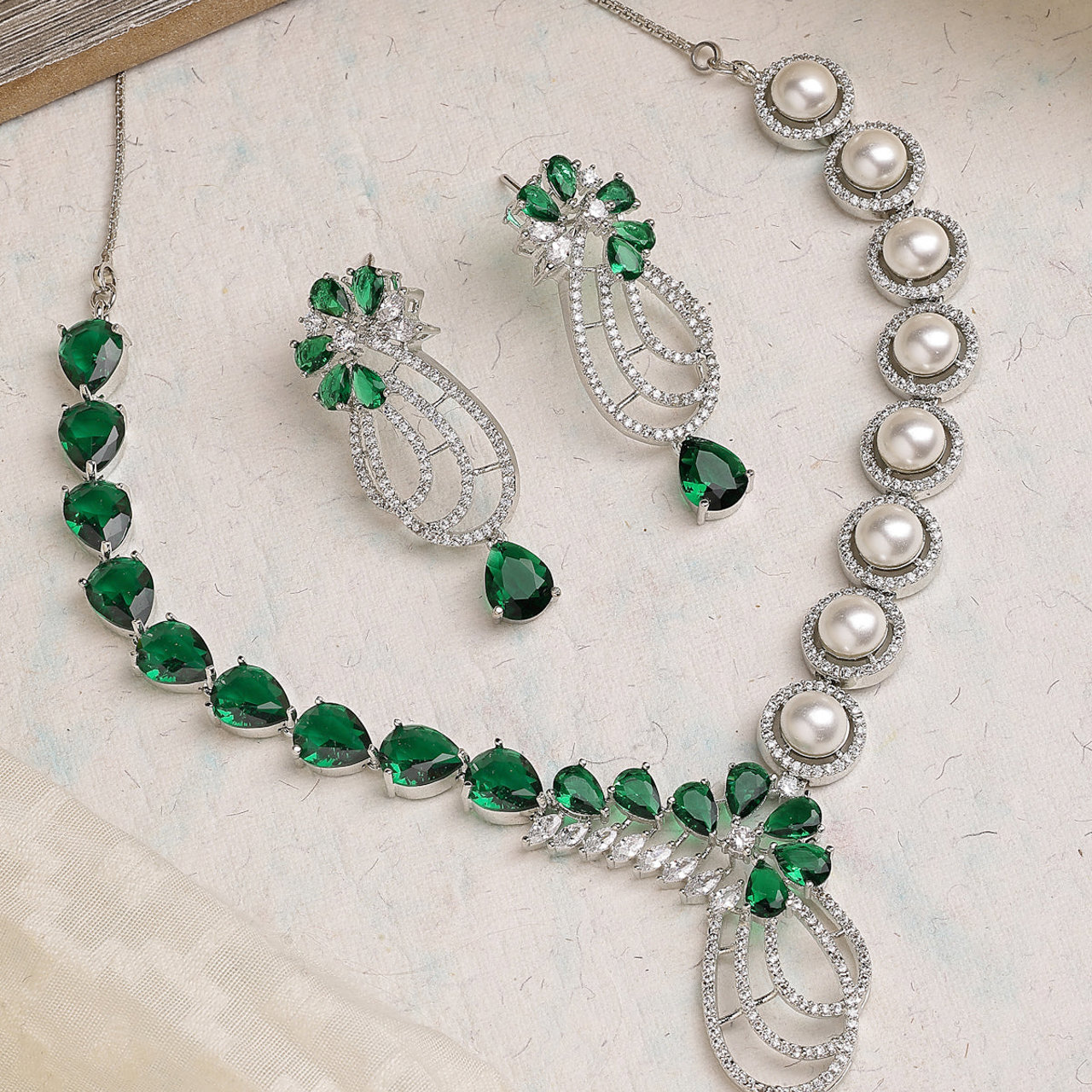 Sukkhi Designer Tear Drop Round Design Rhodium Plated Cubic Zirconia & Pearl Studded Green Brass Collar Necklace & Drop Earrings Jewellery Set for Women