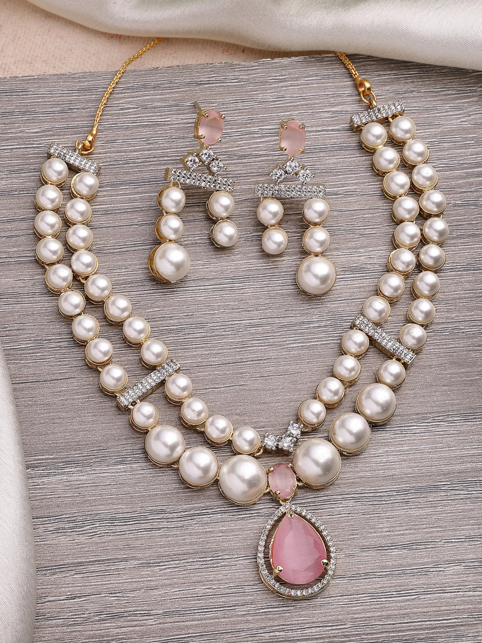 Sukkhi Beautiful Pink Pear Design Gold Plated Cubic Zirconia & Pearl Studded Brass Two Layered Collar Necklace & Drop Earrings Jewellery Set for Women