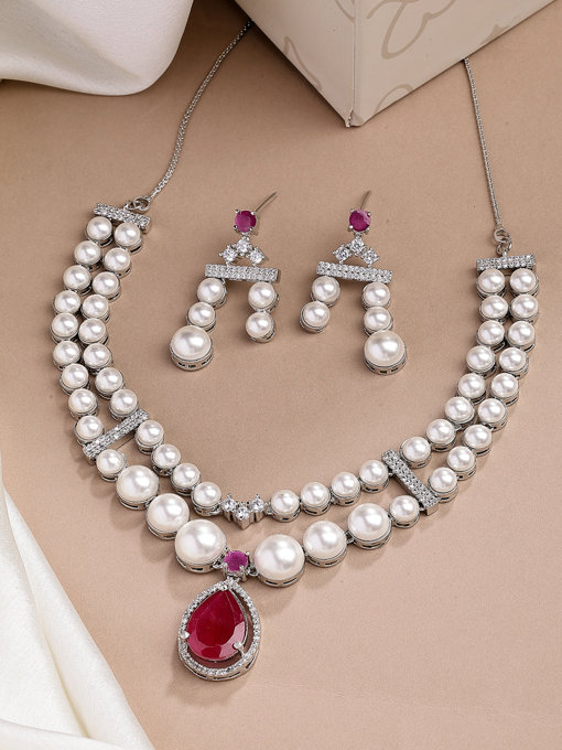 Sukkhi Pretty Red Pear Design Rhodium Plated with CZ & Pearl Studded Brass Two Layered Collar Necklace With Drop Earrings Jewellery Set for Women