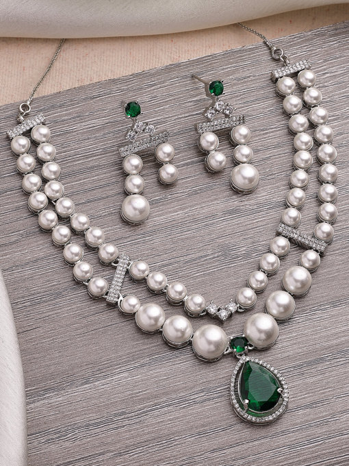 Sukkhi Elegant Green Pear Design Rhodium Plated with CZ & Pearl Studded Brass Two Layered Collar Necklace with Drop Earrings Jewellery Set for Women
