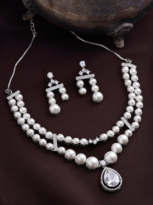 Sukkhi Classic Pear Design Rhodium Plated with CZ & Pearl Studded Brass White Two Layered Collar Necklace with Drop Earrings Jewellery Set for Women