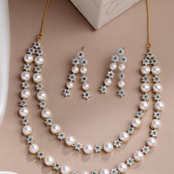 Sukkhi Delicate Floral Design Gold Plated with CZ & Pearl Studded Green Brass Two Layered Collar Necklace with Drop Earrings Jewellery Set for Women