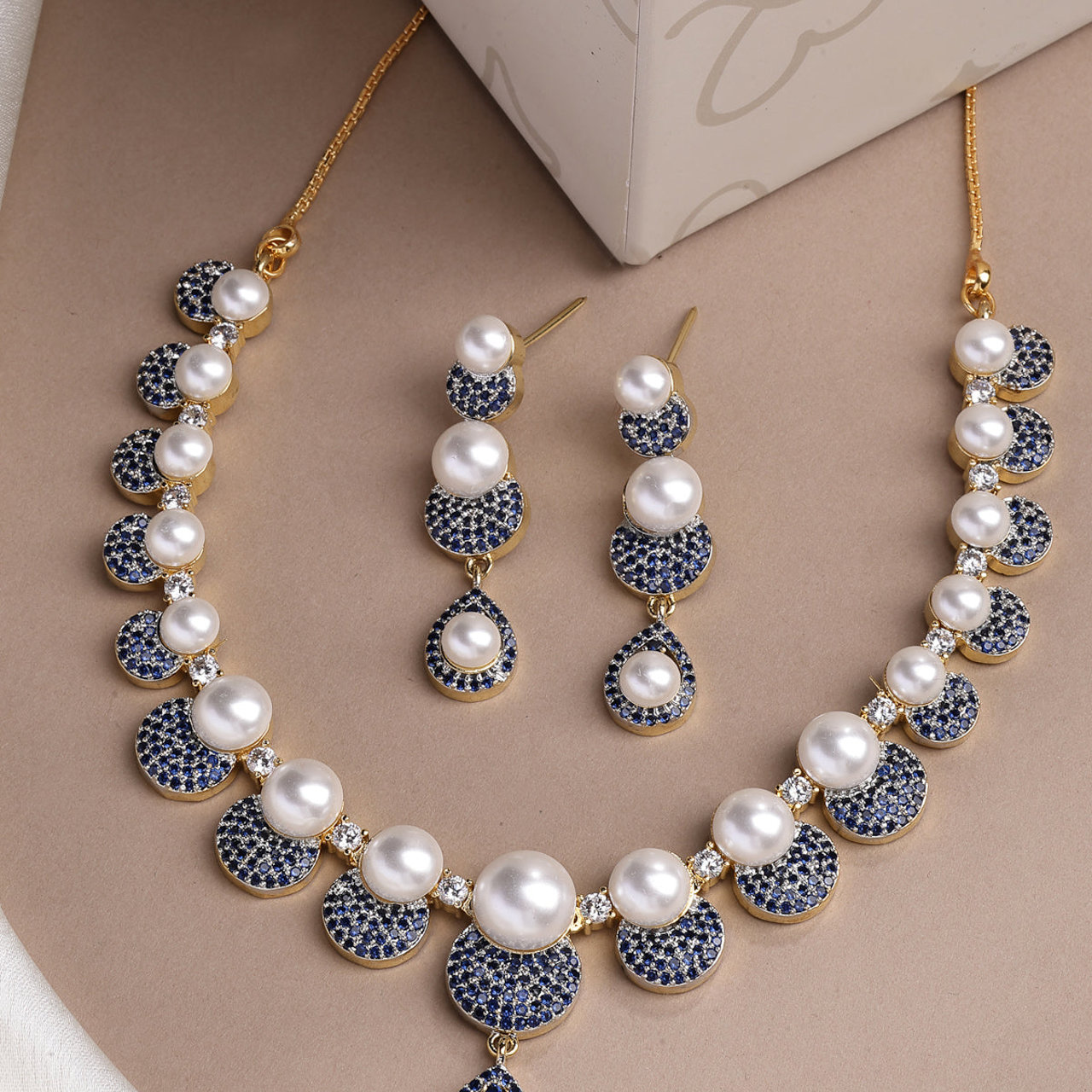 Sukkhi Splendid Geometric Design Gold Plated with Cubic Zirconia & Pearl Studded Blue Brass Collar Necklace with Drop Earrings Jewellery Set for Women