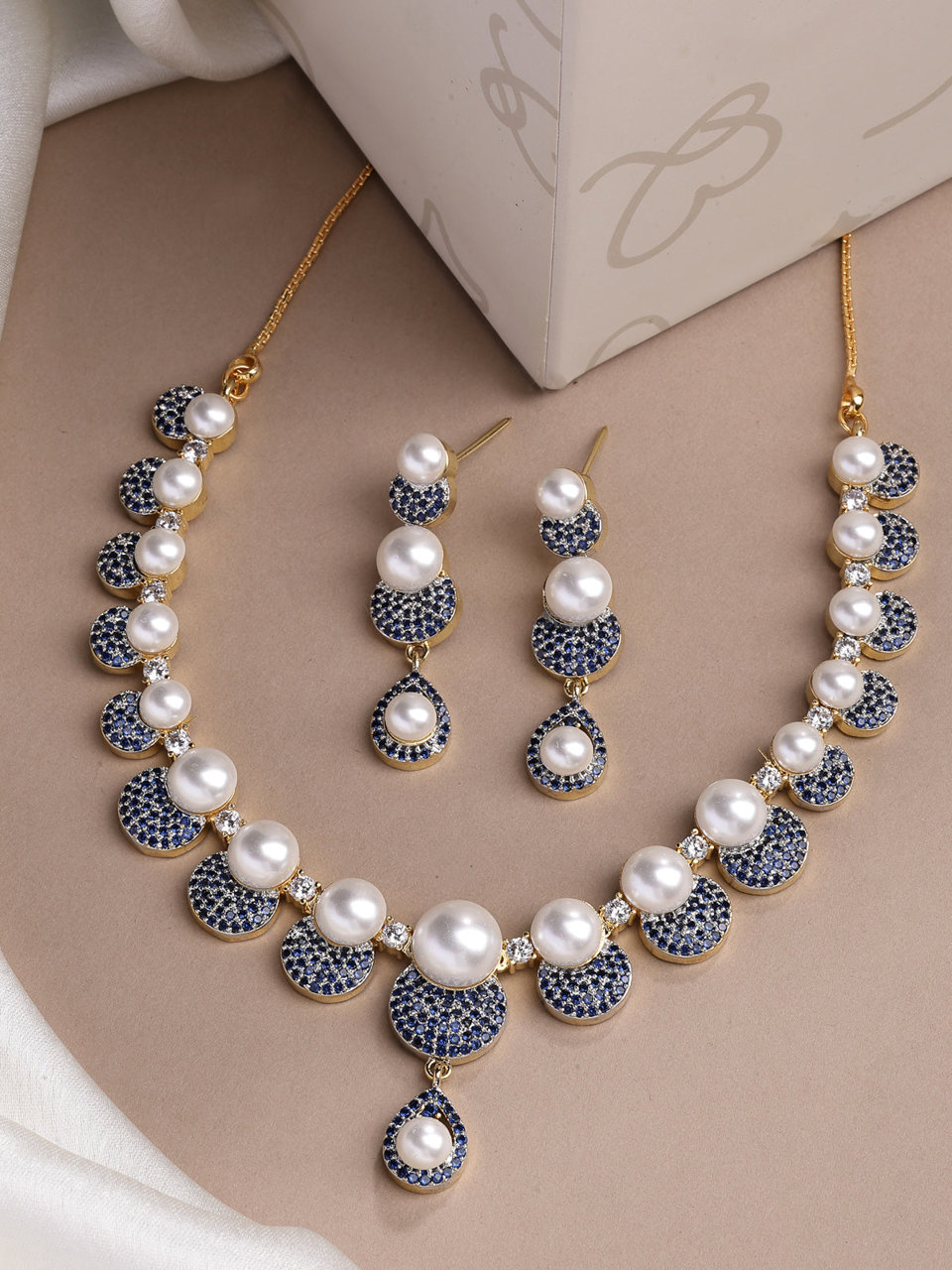 Sukkhi Splendid Geometric Design Gold Plated with Cubic Zirconia & Pearl Studded Blue Brass Collar Necklace with Drop Earrings Jewellery Set for Women