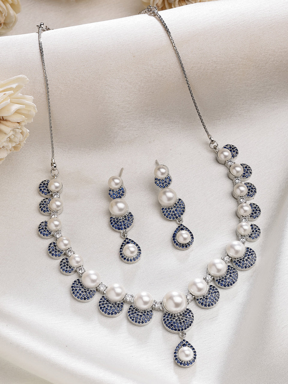Sukkhi Smart Round Design Rhodium Plated with Cubic Zirconia & Pearl Studded Blue Brass Collar Necklace with Drop Earrings Jewellery Set for Women