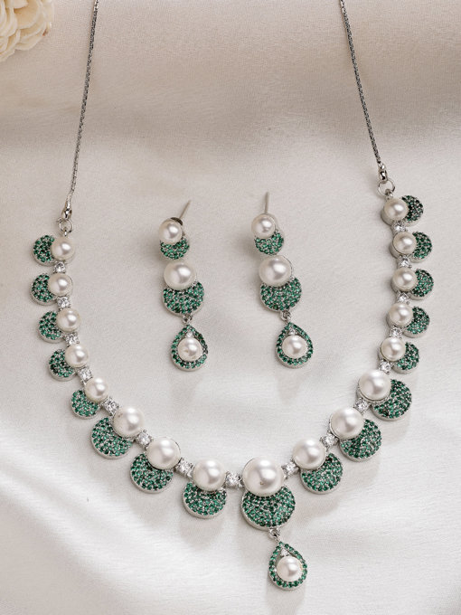 Sukkhi Charming Round Design Rhodium Plated with Cubic Zirconia & Pearl Studded Green Brass Collar Necklace with Drop Earrings Jewellery Set for Women