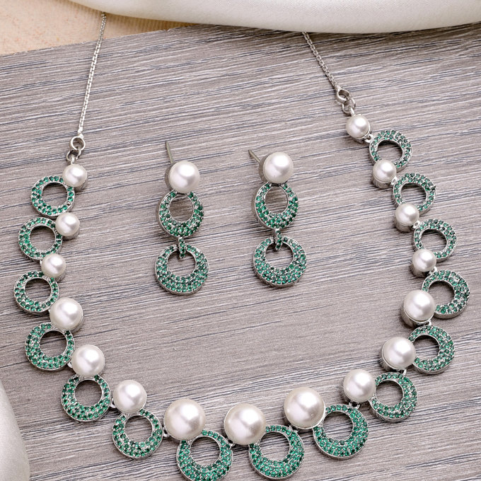 Sukkhi Classy Style Rhodium Plated with Cubic Zirconia & Pearl Studded Green Brass Collar Necklace with Drop Earrings Jewellery Set for Women