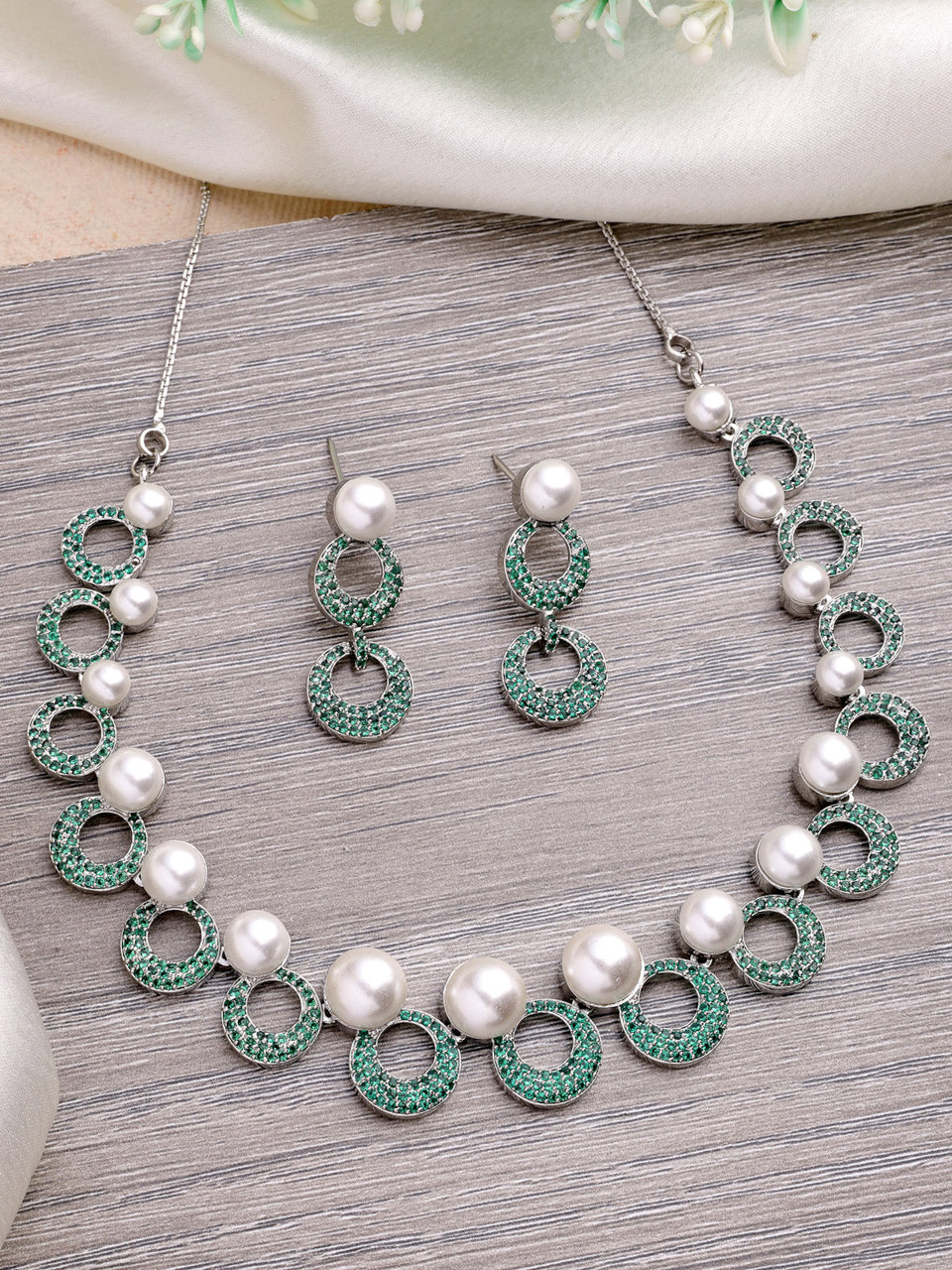 Sukkhi Classy Style Rhodium Plated with Cubic Zirconia & Pearl Studded Green Brass Collar Necklace with Drop Earrings Jewellery Set for Women