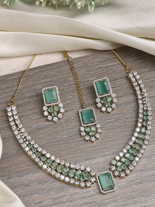 Sukkhi Beautiful Gold Plated with Cubic Zirconia Studded Brass Mint Green Collar Necklace with Studs Earring & Maangtikka Jewellery Set for Women