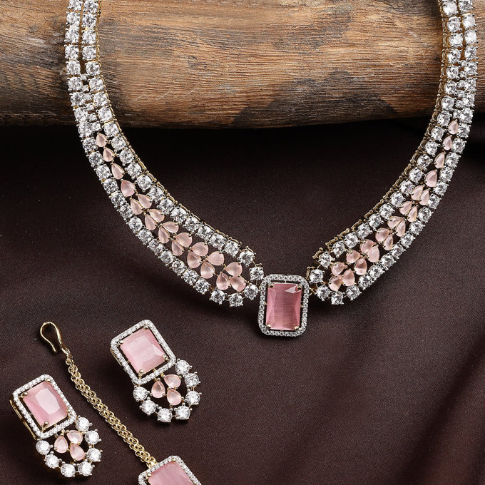 Sukkhi Charming Pink Fashion Gold Plated with Cubic Zirconia Studded Brass Collar Necklace with Studs Earring & Maangtikka Jewellery Set for Women
