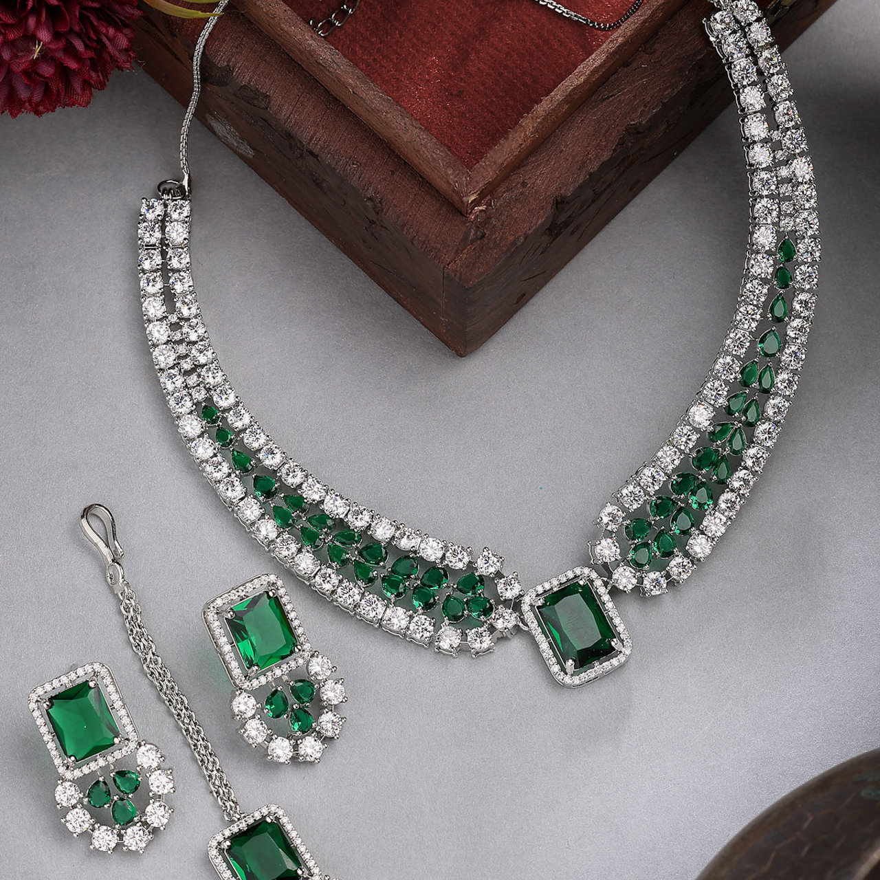 Sukkhi Latest Stylish Rhodium Plated Cubic Zirconia Studded Brass Emerald Green Collar Necklace & Studs Earring & Maangtikka Jewellery Set for Women