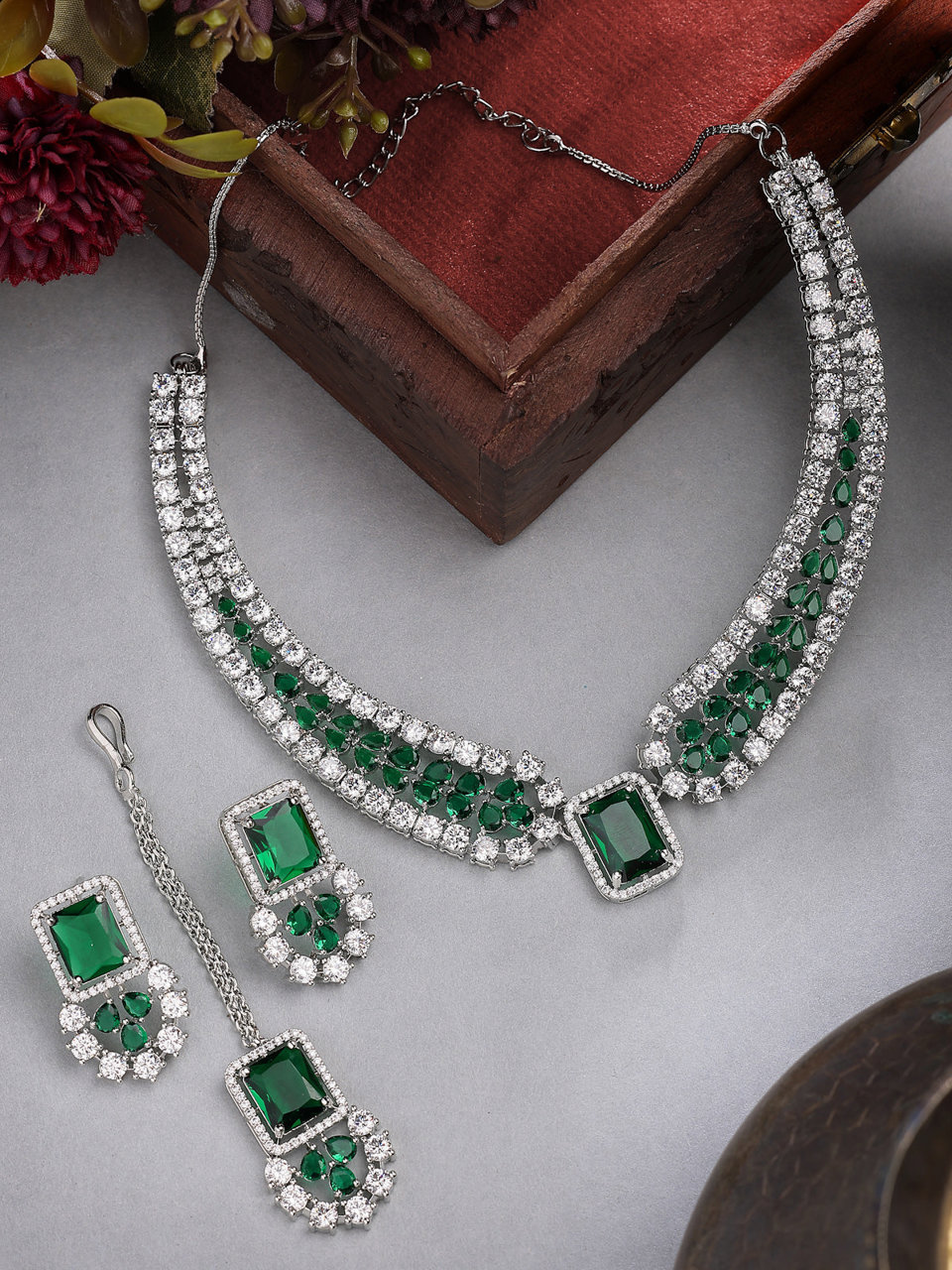 Sukkhi Latest Stylish Rhodium Plated Cubic Zirconia Studded Brass Emerald Green Collar Necklace & Studs Earring & Maangtikka Jewellery Set for Women