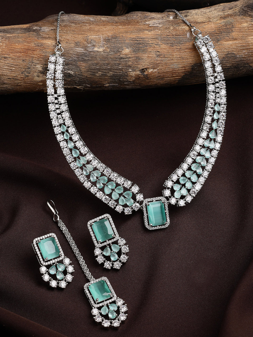 Sukkhi Elegant Style Rhodium Plated Cubic Zirconia Studded Mint Green Brass Collar Necklace with Studs Earring & Maangtikka Jewellery Set for Women