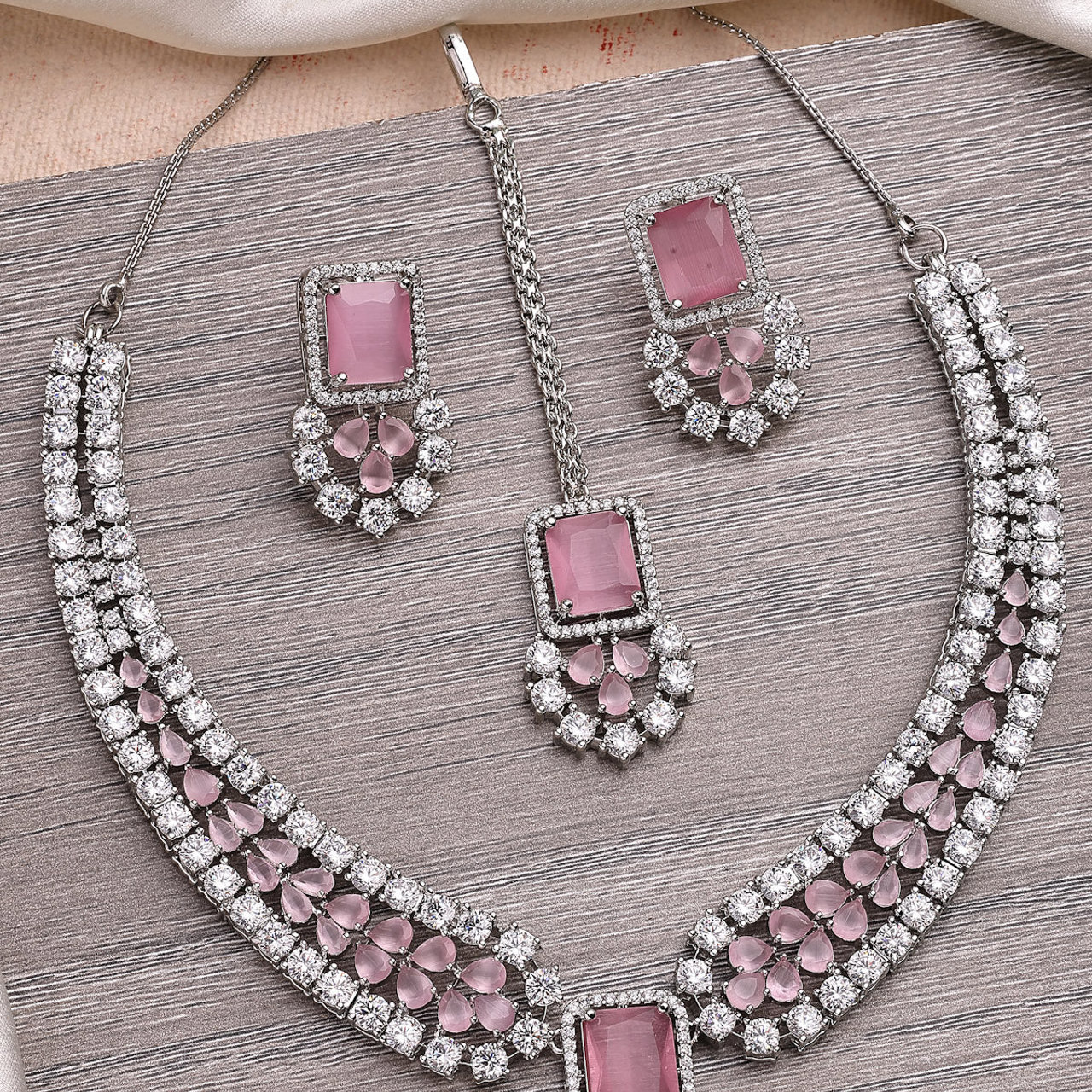 Sukkhi Preety Pink Stylish Rhodium Plated Cubic Zirconia Diamond Studded Brass Collar Necklace with Studs Earring & Maangtikka Jewellery Set for Women