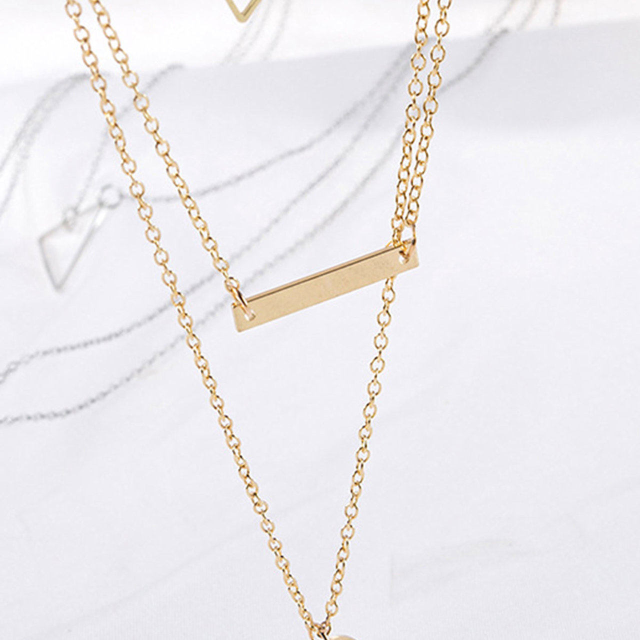 Scintillare by Sukkhi Ravishing Geometric Multi Layered Gold Plated Necklace for Women