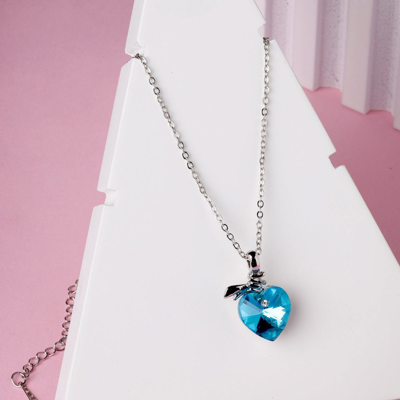 Scintillare by Sukkhi Beautiful Blue Titanic Valentine Heart Crystals With Rhodium Plated Silver Pendant With Chain for Women And Girls