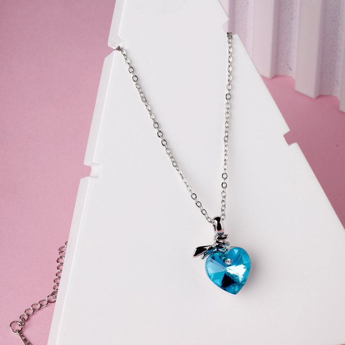 Scintillare by Sukkhi Beautiful Blue Titanic Valentine Heart Crystals With Rhodium Plated Silver Pendant With Chain for Women And Girls