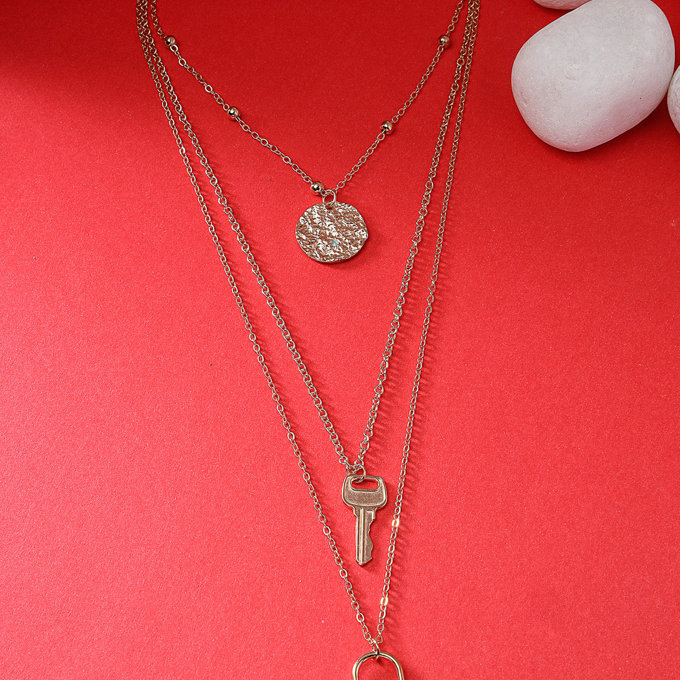 Scintillare by Sukkhi Decent Fashionable Non-Precious Key Lock Multilayer Gold Plated Chain Pendant Necklace for Women